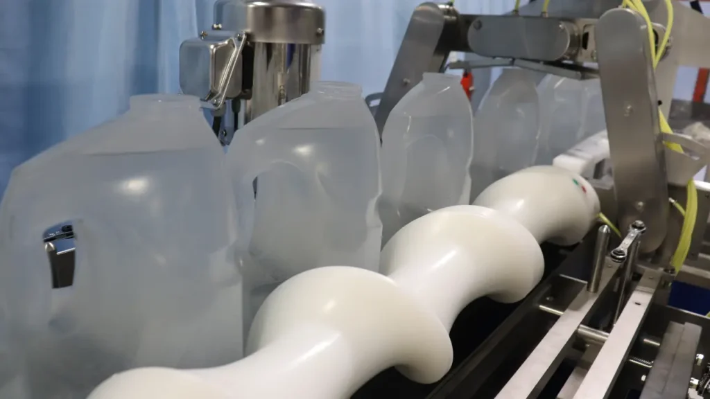 Optimizing Spacing for Uncapped BBQ Bottles with Dual Metering
