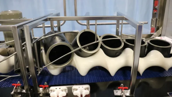 Inverting Paint Cans for Date Coding – High Speed System in Action