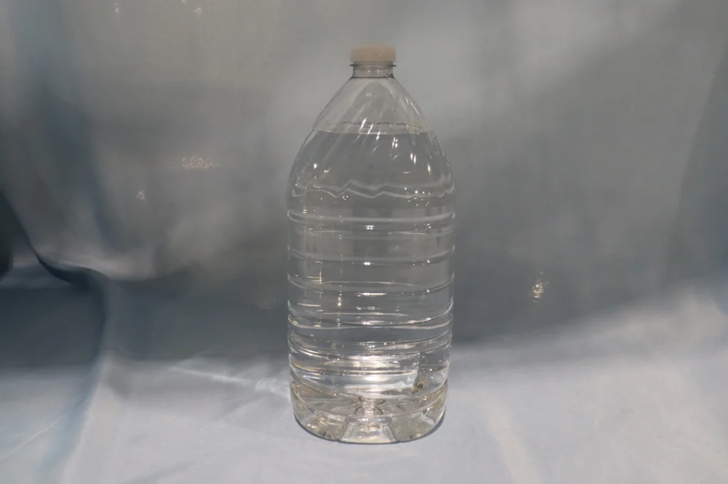 Dual Servo Bottle Spacing System for Neck Banding Applications