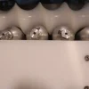 Inline Orienting System for Precise Container Alignment